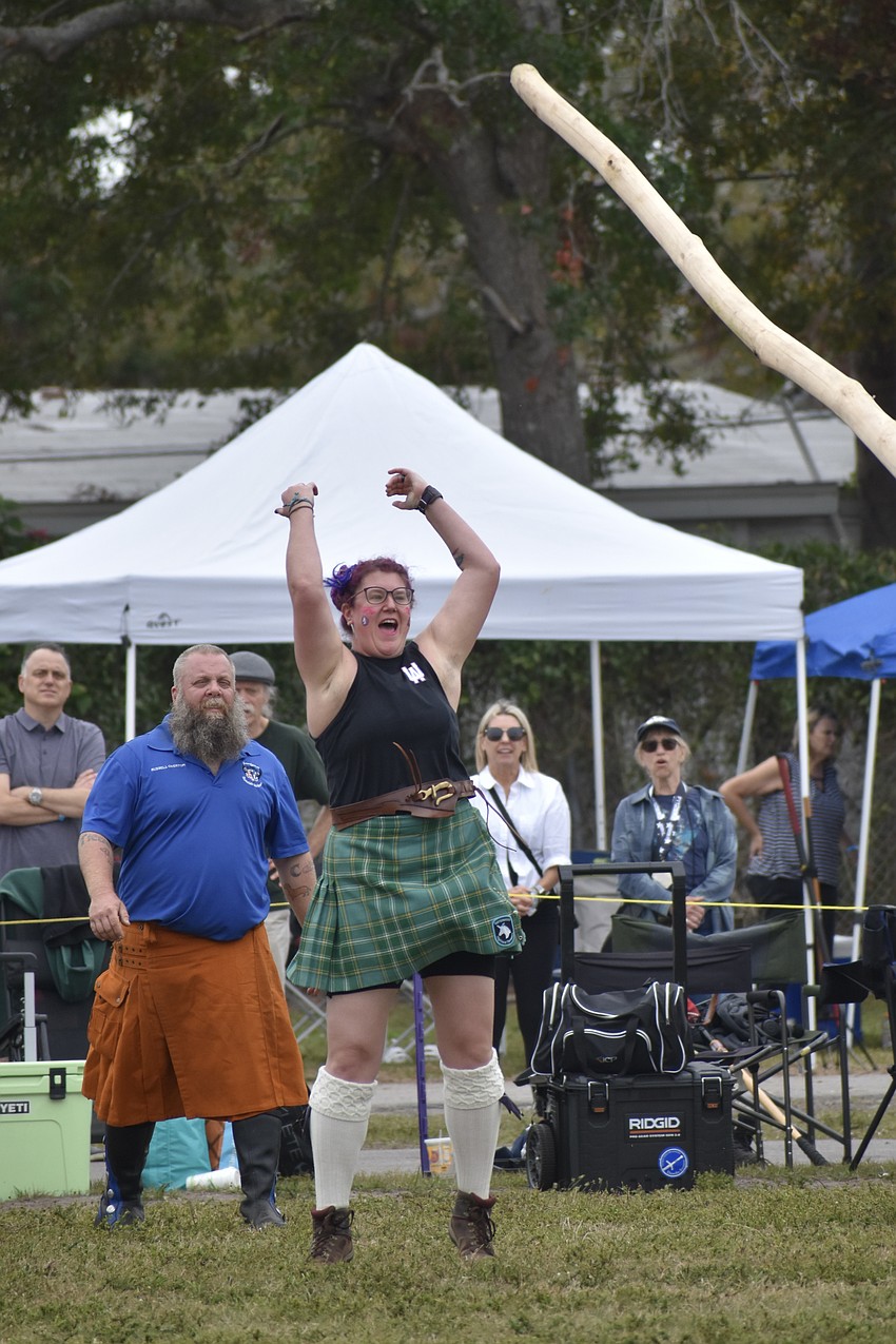 Nix Houston does the caber toss.