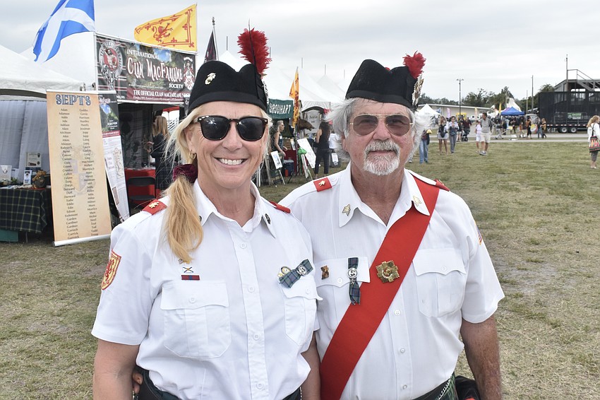 Leslie Jones and Bob Fair, president of Suncoast Scots, are part of the group Lion Rampant Pipe & Drum.