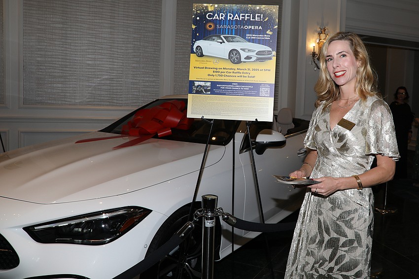 Lael A. Mohib, director of marketing, stands by the 2025 Mercedes-Benz CLE 300 Convertible. The winner of the car will be chosen March 31.