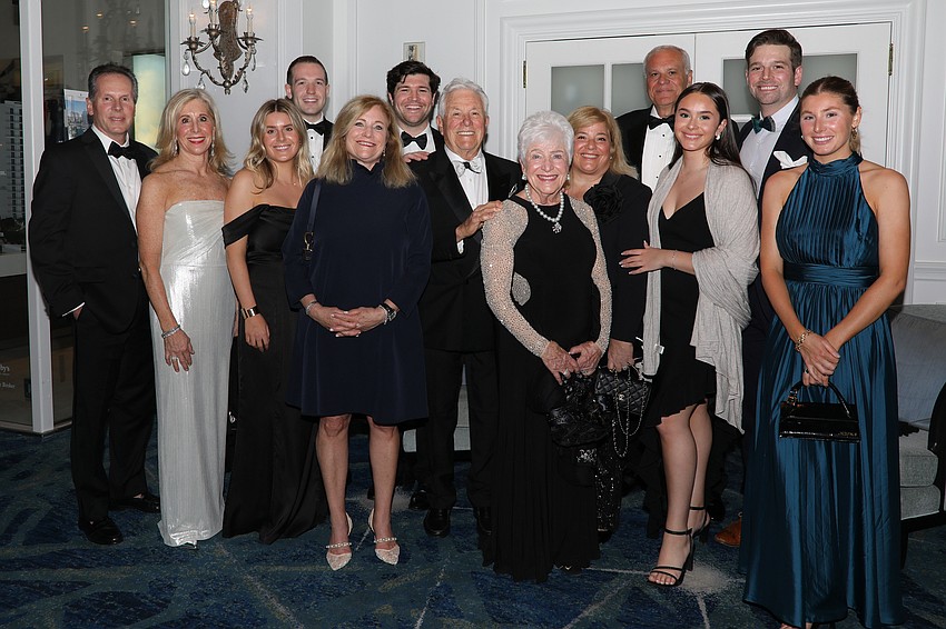 For their contributions to the Sarasota Opera Les and Carol Brualdi, center, are being honored and attend the gala with their family.