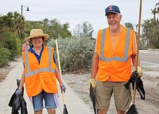 Belinda Bauer and Pete Haselhorst join the community cleanup.