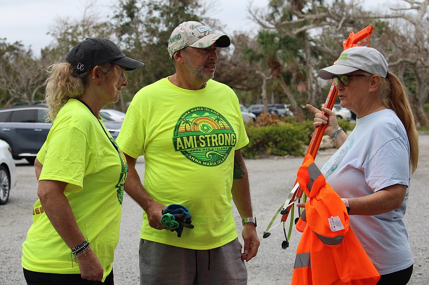 Shira and Dave Schiller turn in their equipment.