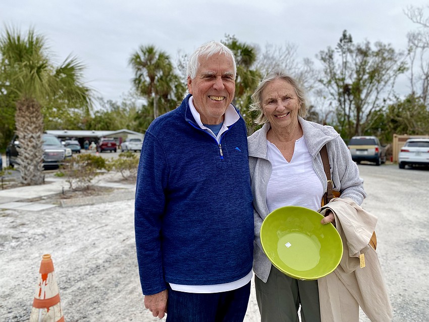Robbie and Judy Ross show off their finds from the reopening of The Lord's Warehouse.
