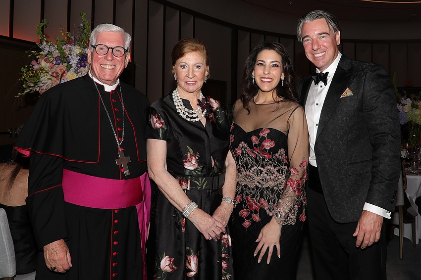 Bishop Frank Dewane, event chair Bridget Spiess, Giovanna Barrios and Chad Turnbull