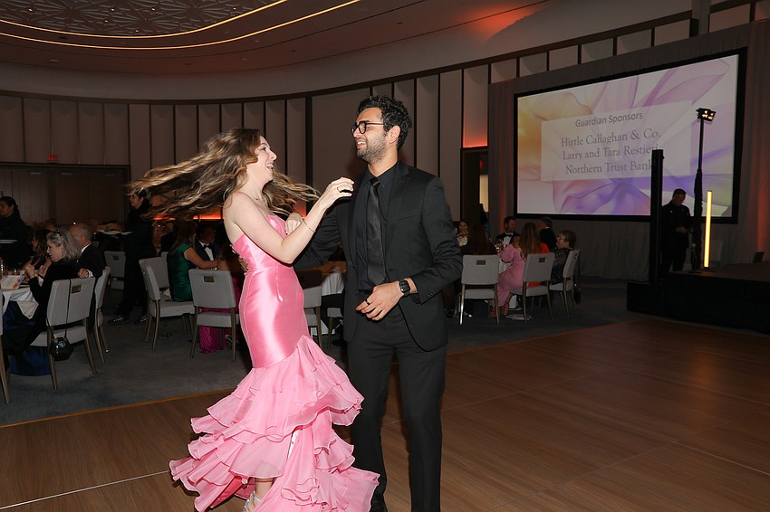Kylie Robinson and Abhi Pavshe cut the rug at the 2025 Catholic Charities Ball held at the St. Regis on Longboat Key.