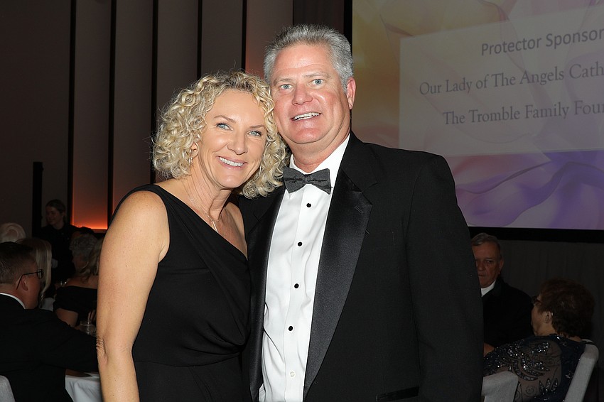 Jenny and Paul Hudson attend the Catholic Charities Ball held at the St. Regis on Longboat Key.