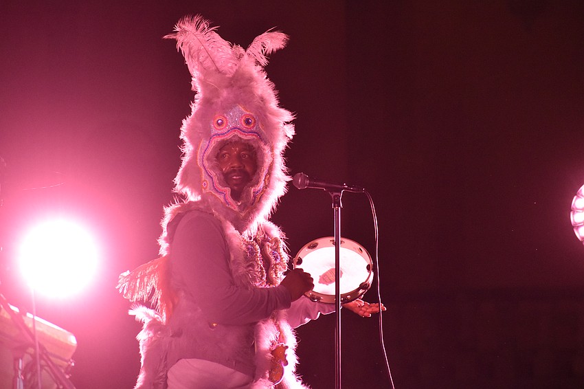 The Spy Boy of Big Chief Romeo Bougere's Mardi Gras Indian tribe, performs with The 79rs Gang. In New Orleans, the Spy Boy always leads the procession of the Big Chief.