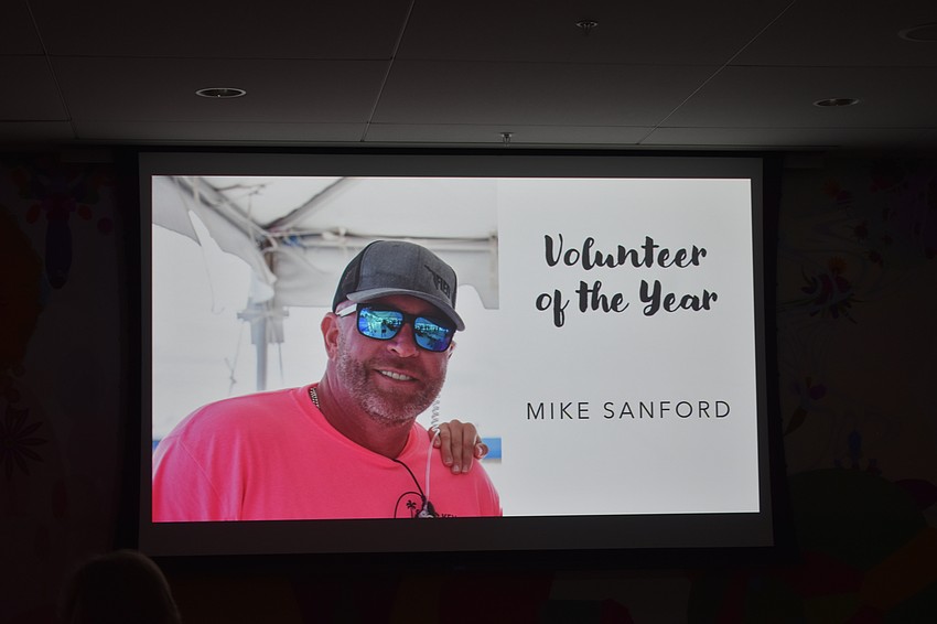 Mike Sanford, who couldn't be present that night, was honored with the Volunteer of the Year award. A volunteer for the Siesta Key Crystal Classic, he worked every day of the event to cart gallons of fuel to fill generators, offer snacks, deliver bags of ice and restock drinks.