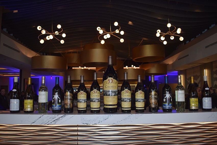 Visitors to Fleming's Prime Steakhouse and Wine Bar at UTC are greeted with a display of some of the restaurant's popular wines upon walking in.