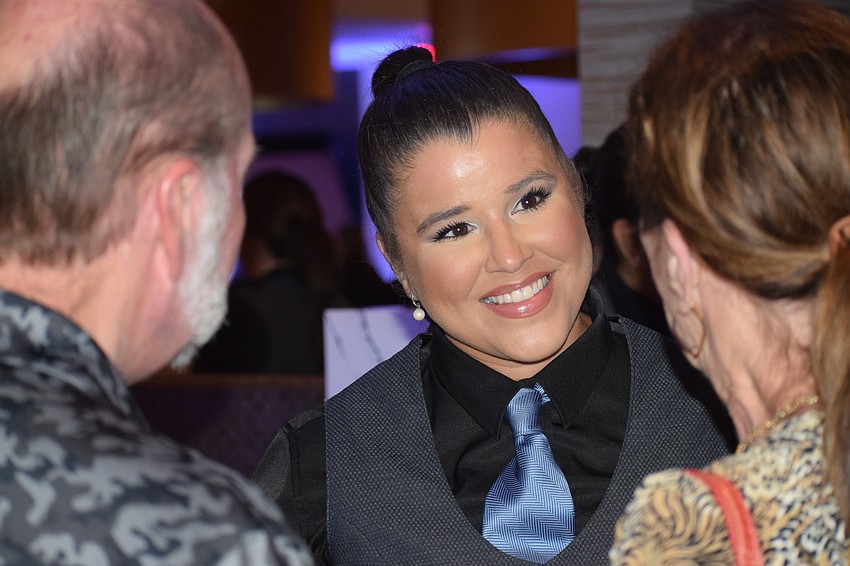 Rachel Biechlin was one of several waitresses on hand to serve Hors d'oeuvres during a soft opening event for Fleming's Prime Steakhouse and Wine Bar at UTC Saturday.