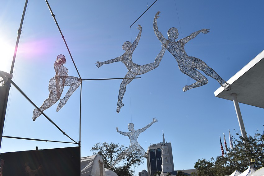 A mobile of figures hangs above Main Street.