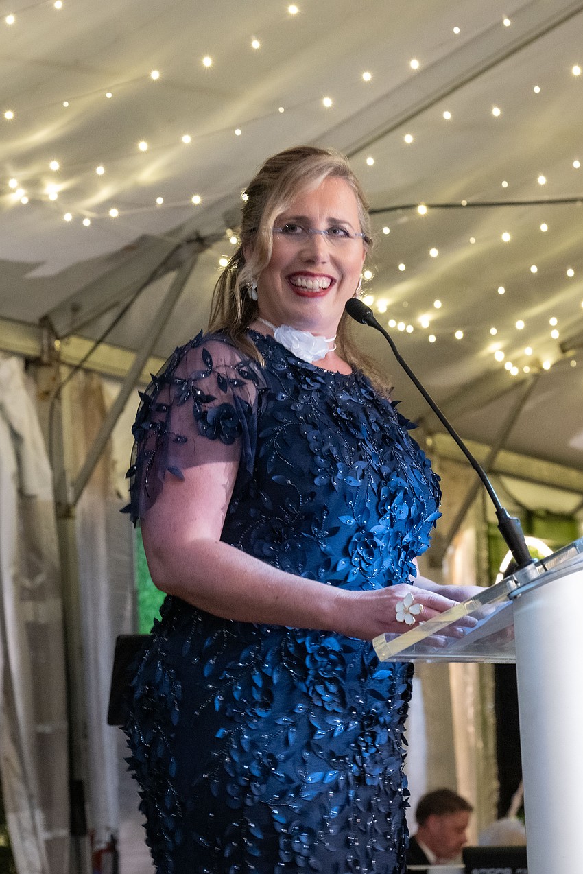 Selby Gardens President and CEO Jennifer Rominiecki addresses Orchid Ball guests.