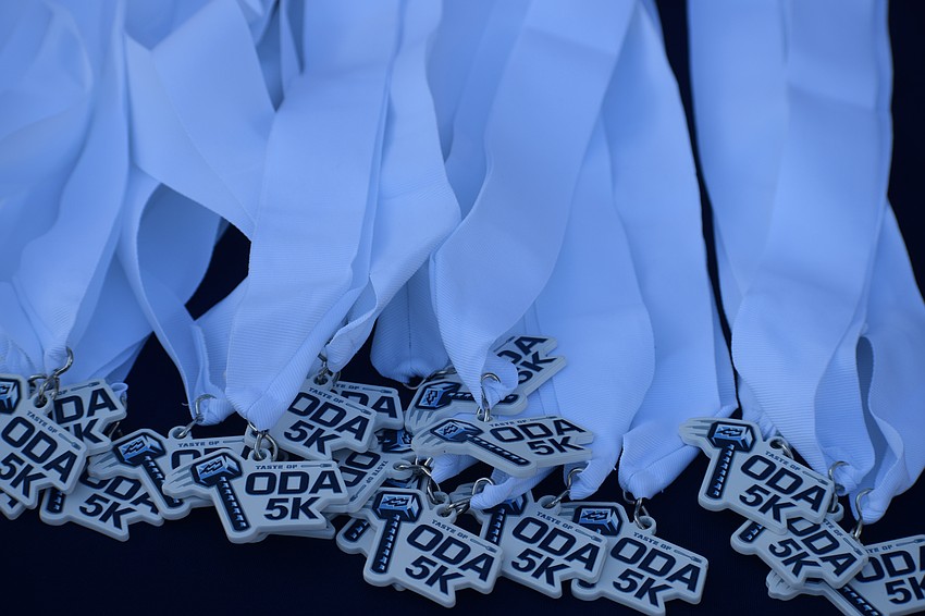 Medals were handed out to all 143 participants at the first-ever Taste of ODA 5K at Out-of-Door Academy.