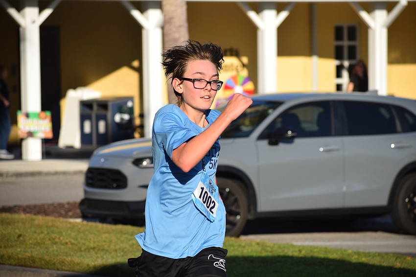 Ethan Romocki crossed the finish line in 26th place with a time of 26:39 at the Taste of ODA 5K on Saturday morning at Out-of-Door Academy.