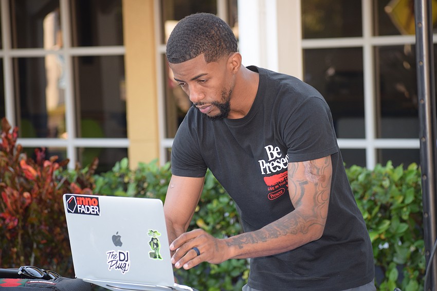 Gerald Benson a.k.a DJ Big Flex was on hand to play music for runners and spectators at the Taste of ODA 5K on Saturday morning.