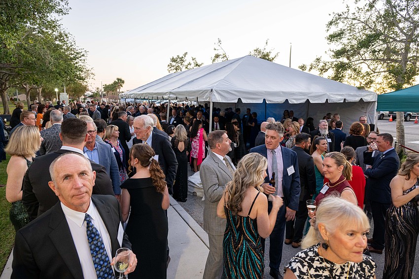 Guests enjoy an outdoor cocktail hour.