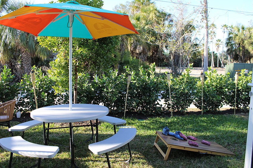 The restaurant features lawn games outdoors.