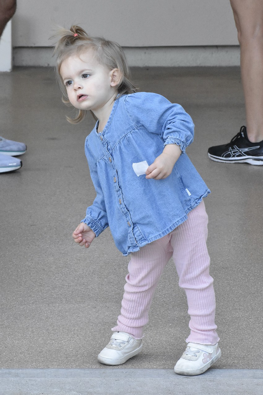 Audrey Locken, 1, dances to trumpet music.