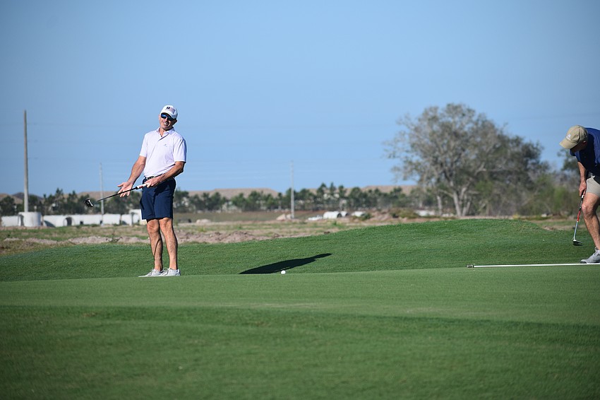 Scott Antritt can't help but smile after missing a tricky putt at Calusa Country Club during the first Lakewood Ranch Community Foundation Charity Golf Scramble Monday.