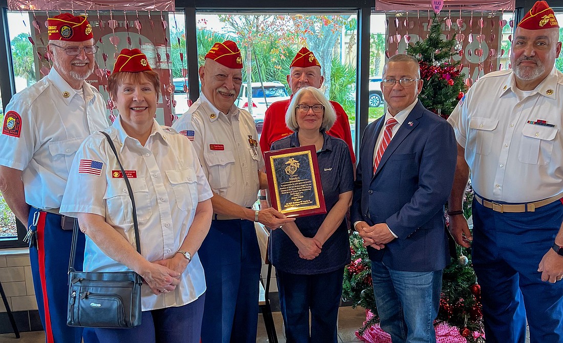 Wendy's manager Kerry Weston and her team were recognized for its support of veterans by the Marine Corps League Detachment 876. Courtesy photo