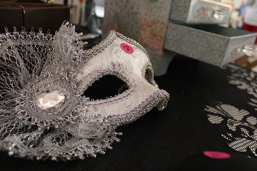 Special displays include jewelry and masquerade items.