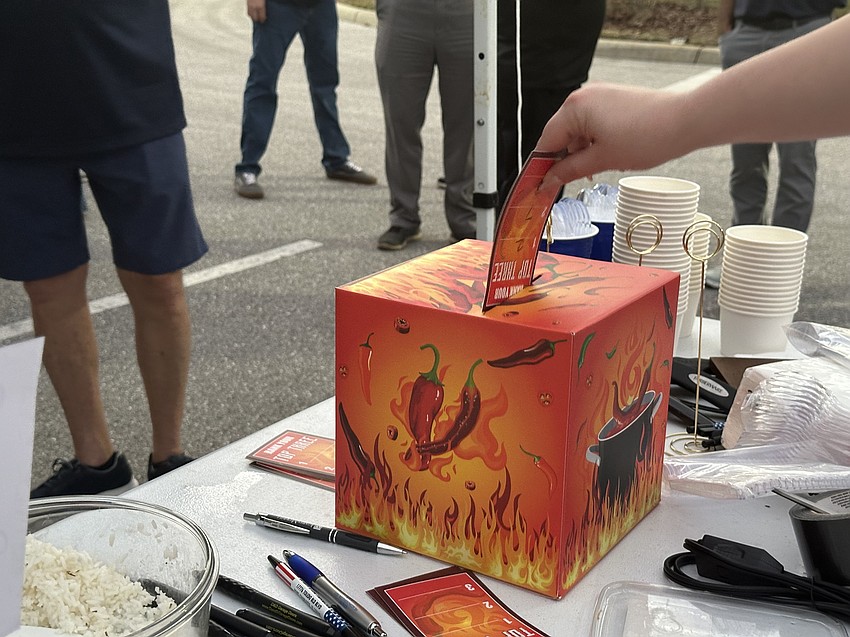 A vote for best chili goes into the ballot box at the Suncoast Builder’s Association’s third annual Chili Cook-off Feb. 13.