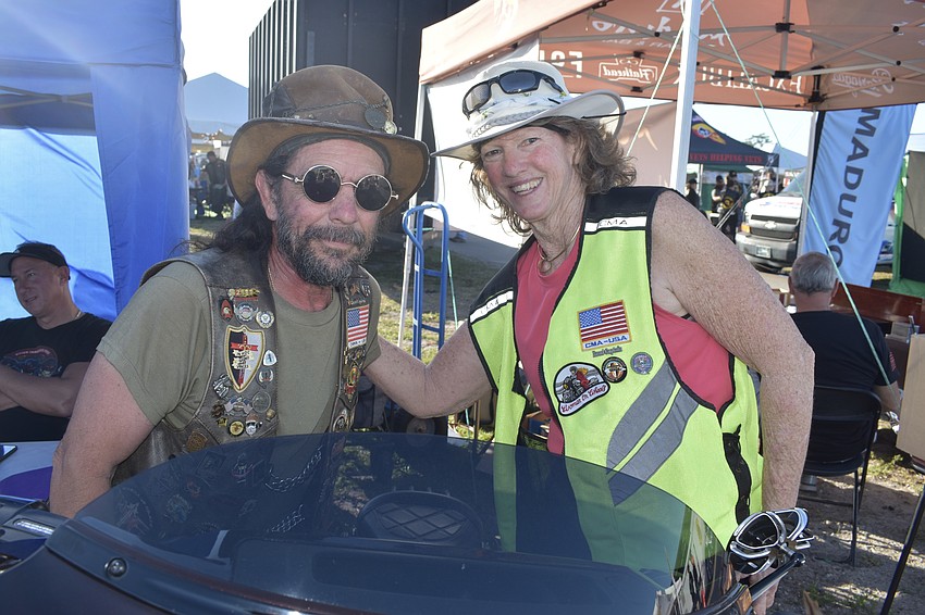 Miles Christian-Hart poses with a friend from high school, Tammy Fieber. They both graduated from Sarasota High School and both are involved in Paradise Riders of Florida, which Hart established.