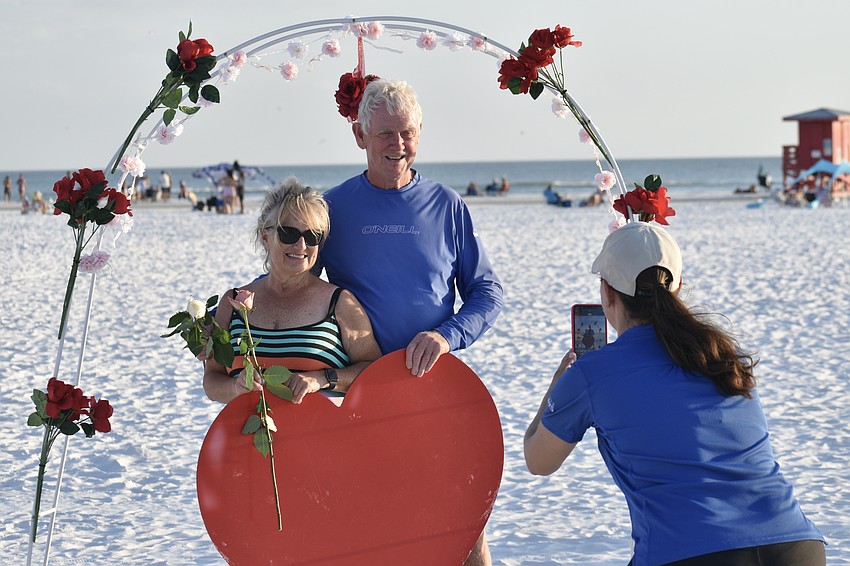 Michael and Shirly Evans of Toronto have their photo taken by Jennifer Lampl of Sarasota County. The couple formerly rented in Siesta Key and enjoy visiting Siesta Key Beach to renew their vows. They have been married 44 years.