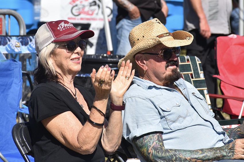 Sarah and John Cortese enjoy the performance by Johnny Diamond.