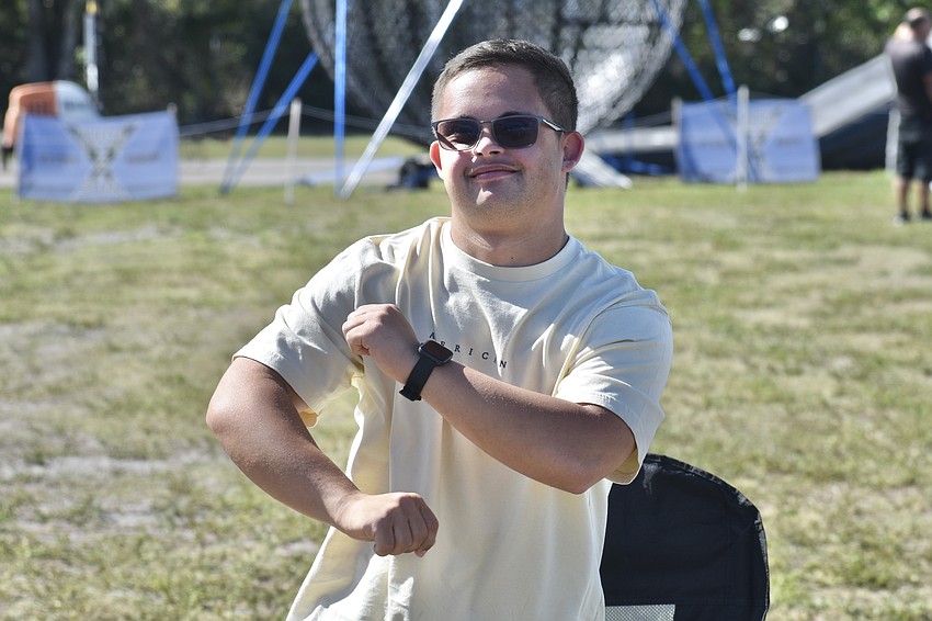 Nick Canizio, 19, who came with his family from St. Pete for the event, dances to the music of Johnny Diamond.
