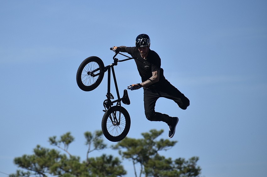 Case Taylor of makes a leap while practicing for the stunt show.
