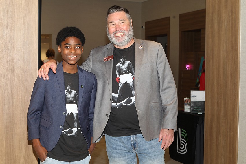 Branden Martin and board member Scooter Maloney have been paired for the past five years.