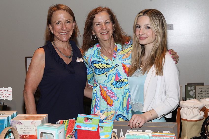 Shirle Finley, Dixi Robertson and Nolan Welch, from Boca Boutique, are donating proceeds to BBBS.