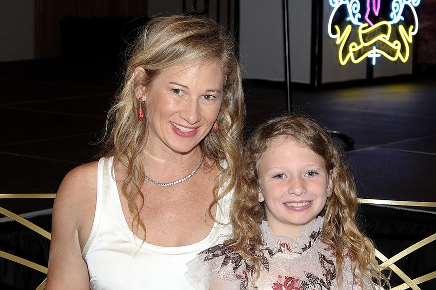 Jennifer and Isabella Groff enjoy some time together at the Live Laugh Love Luncheon.