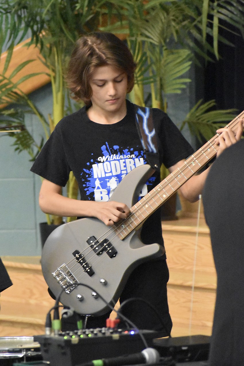 5th Grader Aidan Dwyer performs with Wilkinson's Modern Band.