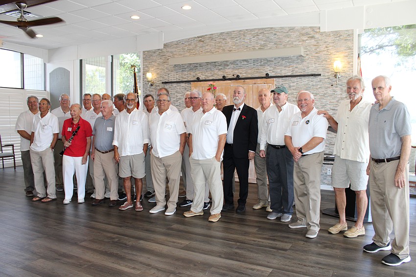 About 20 members of the Men's Club contribute to the Women's Appreciation Day celebration.