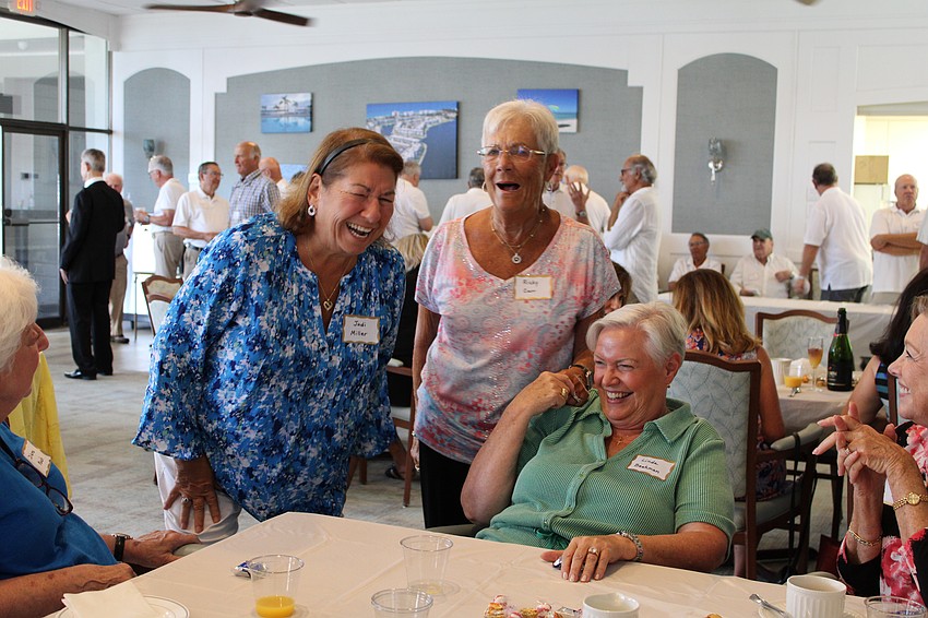 Judi Miller, Ricky Carr and Linda Beckman share a laugh at the brunch.