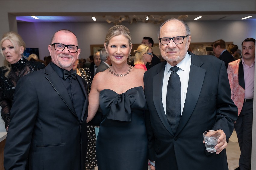 Sarasota Ballet Director Iain Webb, Deputy Executive Director Michelle Butler and Executive Director Joe Volpe at a black tie event.