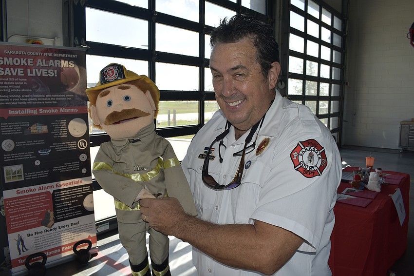 Public Education Coordinator Michael Rodrigue staffed a table at the event.