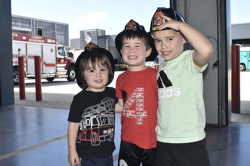 Sarasota's Casey Perez, 2, his brother Cameron Perez, 4 and their neighbor Jaxson Bender, 4, attended the open house together.
