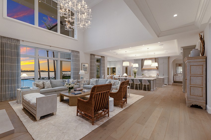 Expansive glass overlooks Little Sarasota Bay at Crystal Waters.