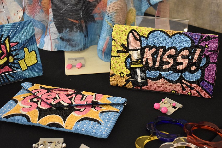 Darci's Boutique has a pop-up shop set up in the back of the ballroom.