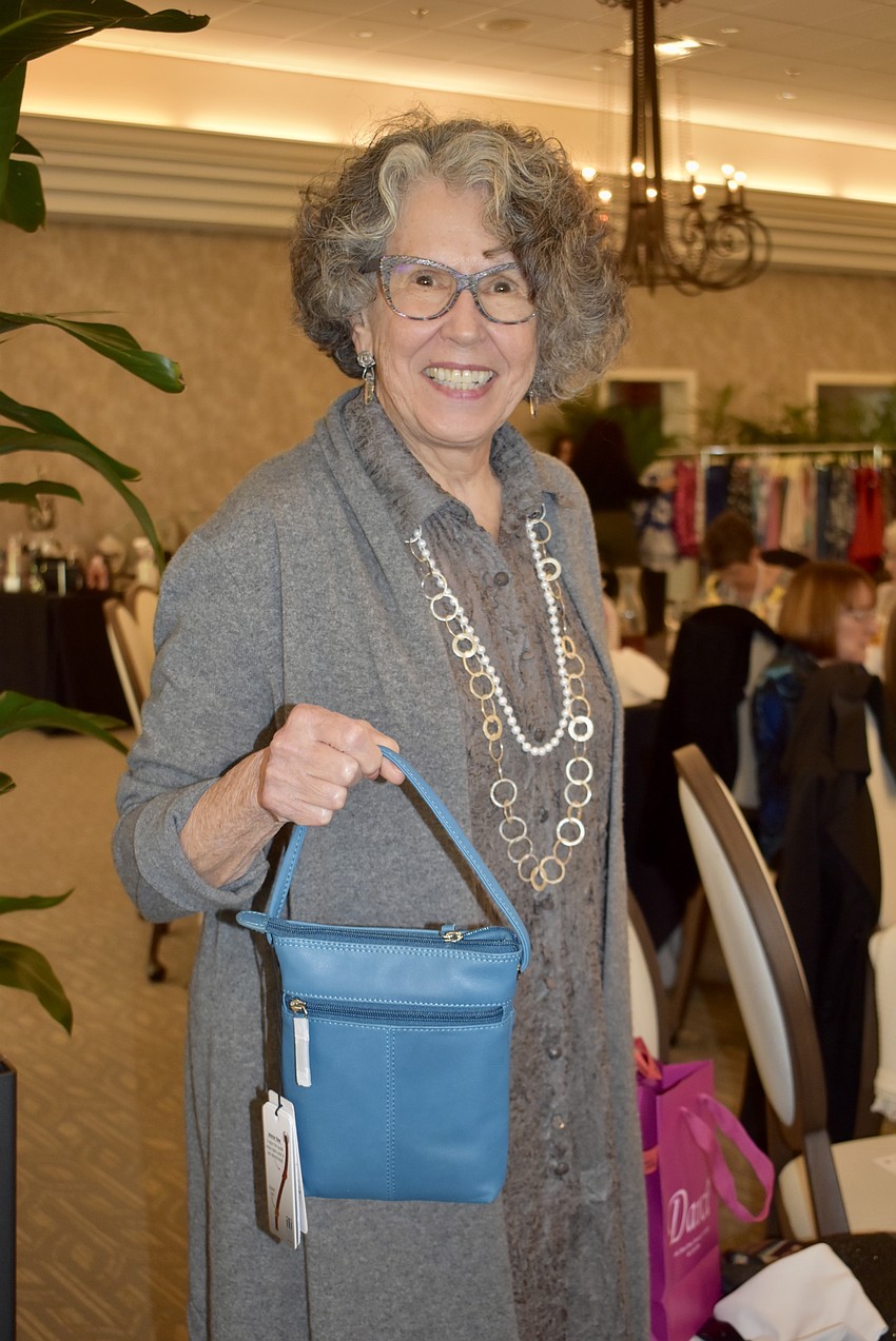 Victoria Frigo is at the luncheon to support her friend Allyson Cooney, who is modeling, and to do a little shopping.