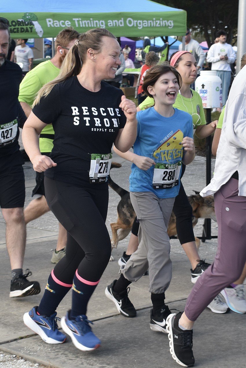 Kate Johnston and her neice Tovah Johnston, 11, run in the race.