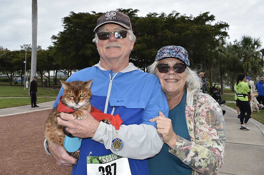 Bali, a Bengal cat belonging to Laura and Tom Walker, participated in the event. Laura Walker says he walks on a leash like a dog.