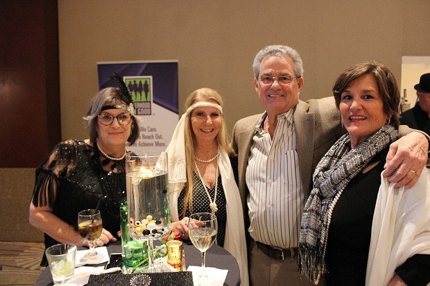 Sarasota's Carol Masio, Penny Kimball, and Keith and Karen Groesbeck came to All That Jazz to support Sisterhood for Good's mission to raise money for local nonprofits.
