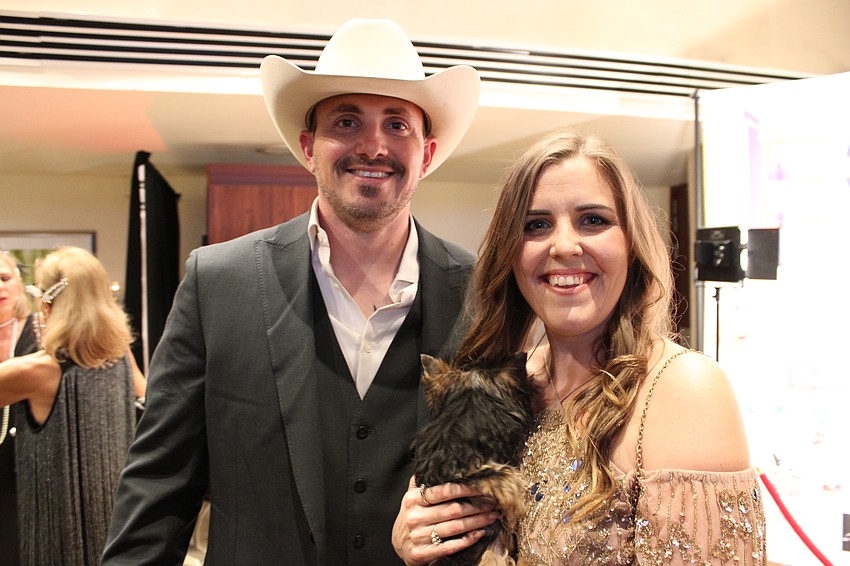 Sarasota's Jarod Rogers and Sarah Rogers attend All That Jazz. Sarah Rogers handled the floral arrangements for the fundraiser.