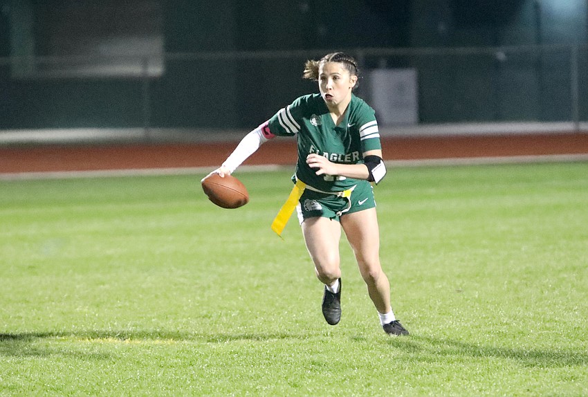 Nereyda Campos playing in an FPC flag football game last season. File photo by Brent Woronoff