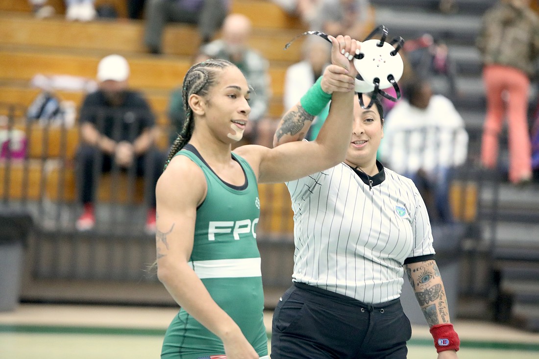 FPC's Christina Borgmann, here after winning the 130-pound title at the Flagler Girls Rotary tournament early this season, battled back to win at regionals on Feb. 22. File photo by Brent Woronoff