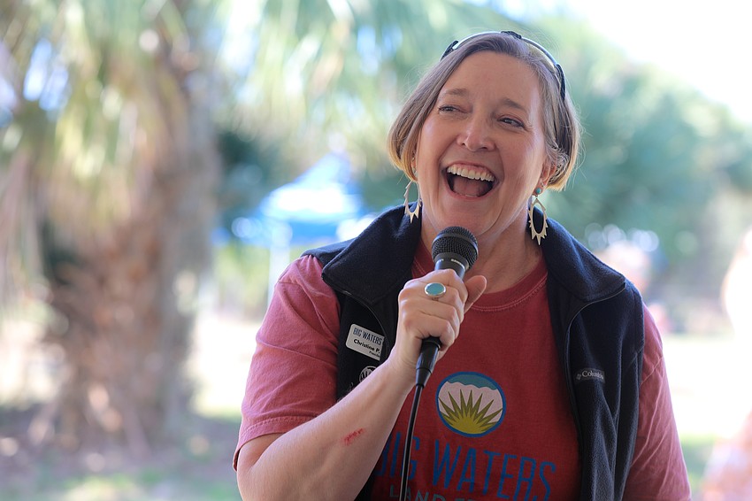 Big Waters Land Trust President Christine Johnson addresses the luncheon guests at Walton Ranch on Feb. 22.